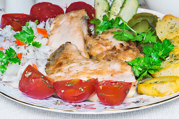 Image showing Baked fish and vegetables .