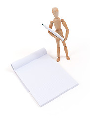 Image showing Wooden mannequin writing 