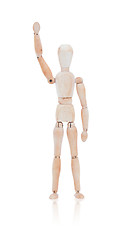 Image showing Wooden dummy man waving hello