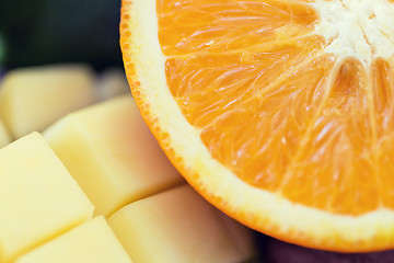 Image showing close up of fresh juicy orange and mango slices