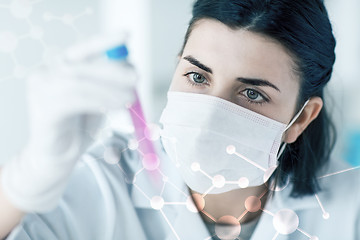 Image showing close up of scientist with tube making test in lab