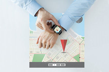 Image showing hands with gps navigator map on smart watch