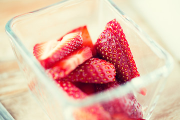 Image showing juicy fresh ripe red strawberries in glass bowl