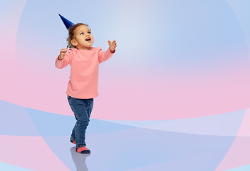 Image showing happy little baby girl with birthday party hat
