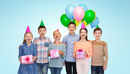 Image showing happy children with gifts on birthday party