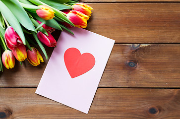 Image showing close up of flowers and greeting card with heart