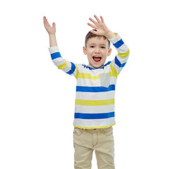 Image showing happy little boy waving hands