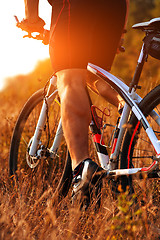 Image showing cyclist riding mountain bike on rocky trail