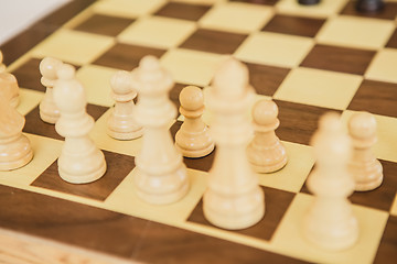 Image showing Chess. White board with chess figures on it.