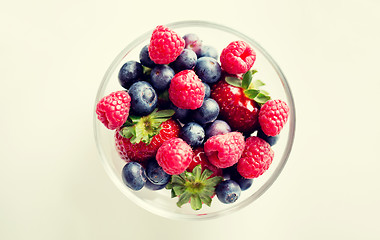 Image showing close up of summer berries in glass bowl