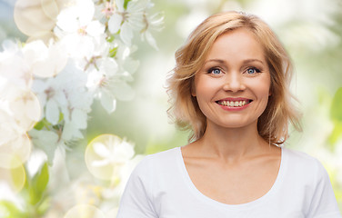 Image showing smiling woman in blank white t-shirt