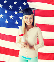 Image showing student in graduation cap with certificate