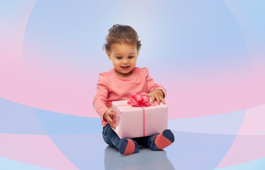 Image showing happy little baby girl with birthday present