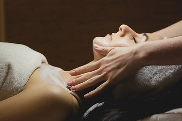 Image showing Close-up of young woman with facial mask