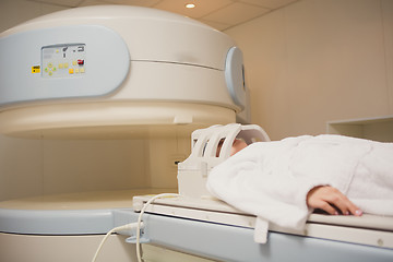 Image showing Patient being scanned and diagnosed on a computed tomography