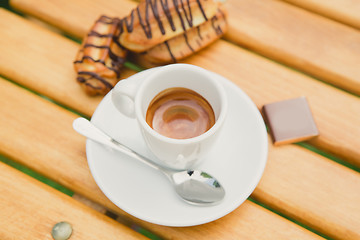 Image showing Morning coffee. Cup coffee in park