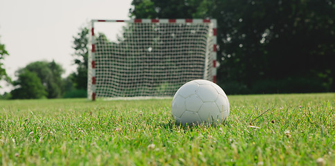 Image showing Soccer ball on the green field