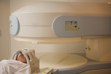 Image showing Patient being scanned and diagnosed on a computed tomography