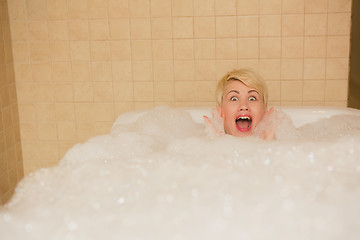 Image showing Woman in hydro massage. She receives medical treatments for relaxation.