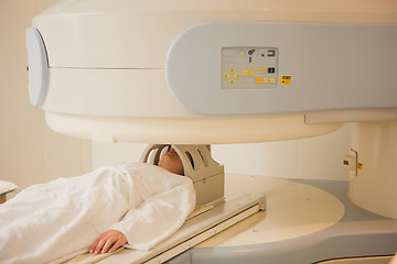 Image showing Patient being scanned and diagnosed on a computed tomography