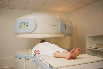 Image showing Patient being scanned and diagnosed on a computed tomography