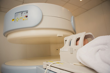 Image showing Patient being scanned and diagnosed on a computed tomography