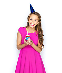 Image showing happy woman or teen girl with birthday cupcake