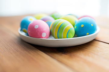 Image showing close up of colored easter eggs on plate