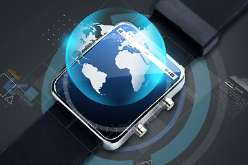 Image showing close up of smart watch with earth globe hologram