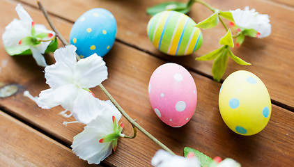 Image showing close up of colored easter eggs and flowers