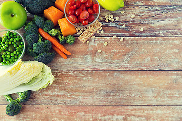 Image showing close up of ripe vegetables on wooden table