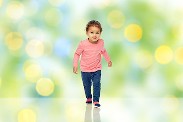 Image showing little african american baby girl walking