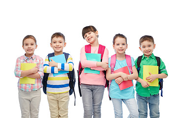Image showing happy children with school bags and notebooks