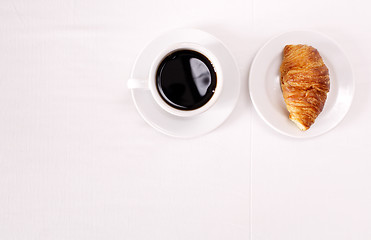 Image showing Coffee and croissant for breakfast