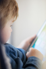 Image showing Young boy using smart tablet