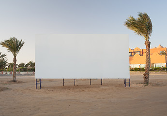 Image showing Blank billboard with palm trees