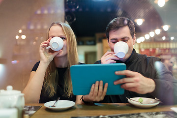 Image showing Man and woman drinking coffee
