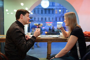 Image showing Man and woman chatting over coffee