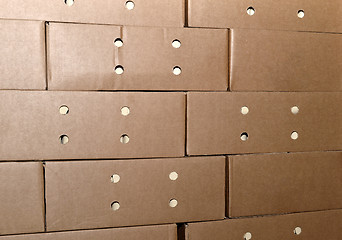 Image showing Cardboard packing boxes in a warehouse, background