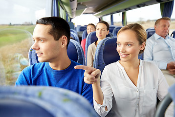 Image showing happy couple or passengers in travel bus