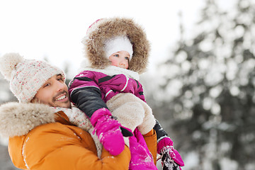 Image showing happy family in winter clothes outdoors