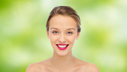 Image showing smiling young woman face and shoulders