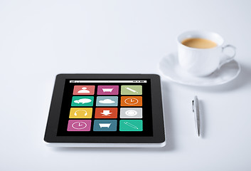 Image showing tablet pc with application icons and cup of coffee