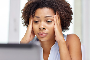 Image showing african woman with laptop at office