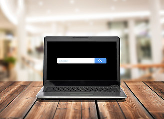Image showing laptop computer with internet search bar on screen