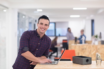 Image showing startup business, young  man portrait at modern office