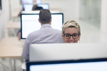 Image showing startup business, woman  working on desktop computer