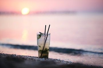 Image showing Mojito cocktail at the seashore