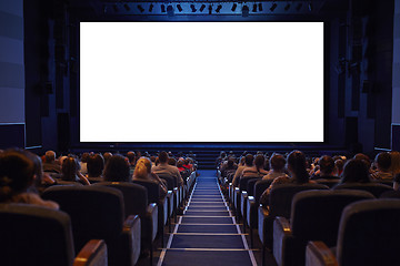 Image showing White cinema screen with audience. 