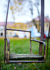 Image showing The broken child\'s swing.